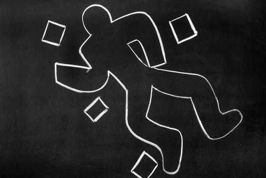 On the blackboard with chalk drawn silhouette of the murdered