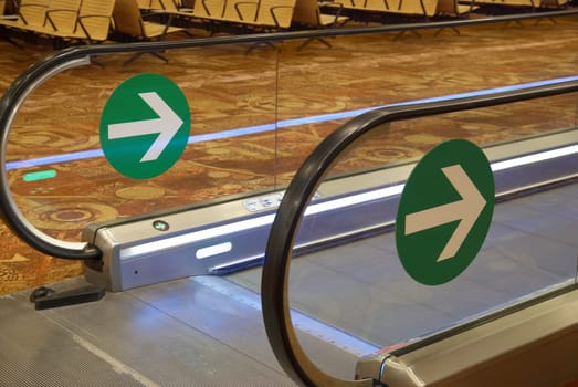 Airport's hall with part of flat escalator