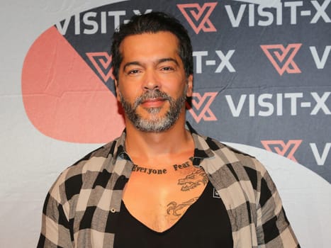 actor and model Aurelio Savina at the erotic fair Venus 2019 in Berlin