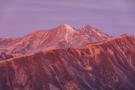 sunrise in Fagaras Mountains, Romania. Lespezi Peak 2517m and Negoiu Peak 2535 m