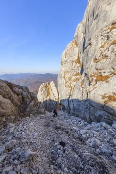 climber on mountain in Piatra Craiului Mountains, Romania