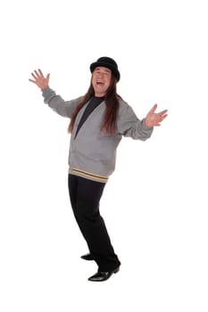 An indigenous man wearing a black hat standing isolated for white.background with his hands outstrechet in the studio.