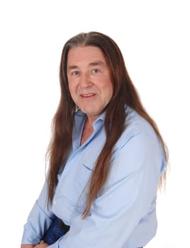 A handsome indigenous man smiling in a portrait shoot with his.long brunette hair, isolated for white background.