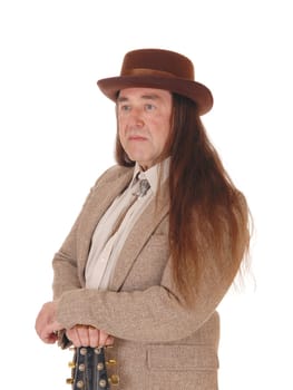 A middle age indigenous man in a portrait picture wearing a beige.shirt and jewellery with his long hair, isolated for white background.