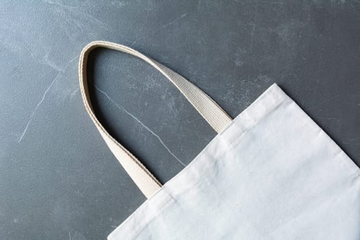 White tote bag canvas fabric. Cloth shopping sack mockup with copy space.
