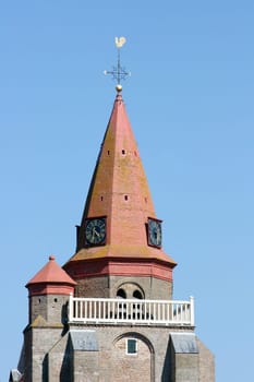 Red Tower with blue sky in the background