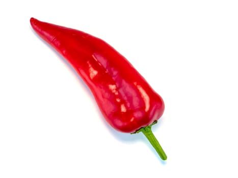 Red pepper on a white background with place for text. Vegetables. Food photo. Agricultural products. Background image. Free place.