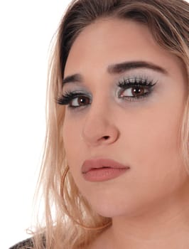 The face of a beautiful young woman with blond hair looking into the.camera, isolated for white background.