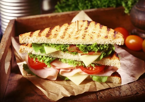 Close Up of Grilled Clubhouse Sandwich with Fresh Toppings