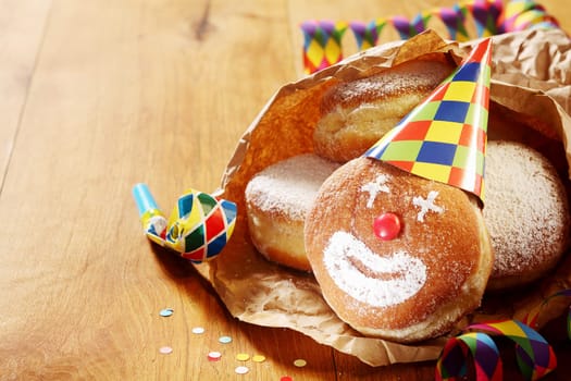 Close up Gourmet Carnival Powdered Sugar Raised Donuts on Paper, Placed on Wooden Table.