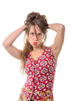 a young woman makes a grimace on the white background