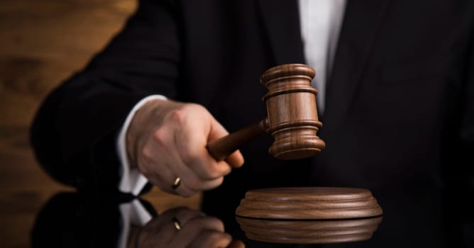 Law and justice concept, Brown wooden background