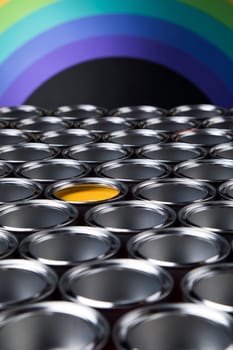 reativity concept group of tin metal cans with color paint