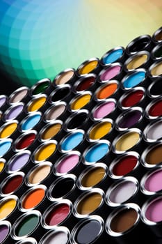 reativity concept group of tin metal cans with color paint