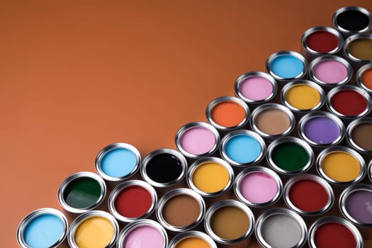 Group of tin metal cans with color paint