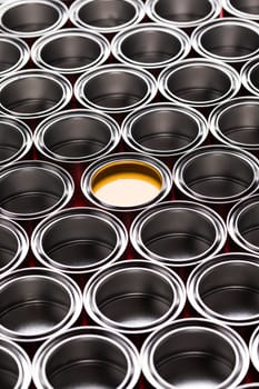 reativity concept group of tin metal cans with color paint