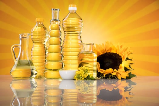 Bottles of sunflower oil with flower