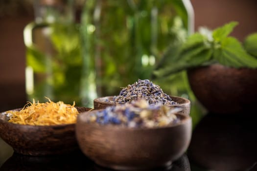 Natural medicine in black mirror background