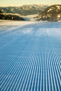 Winter mountains panorama with ski slope
