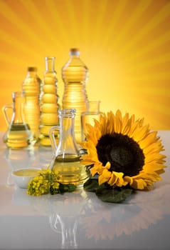 Bottles of sunflower oil with flower