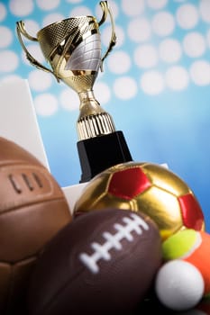 Trophy cup and sport ball background