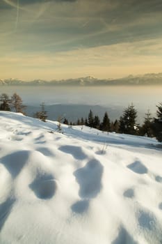Sunset over the mountains, winter landscape