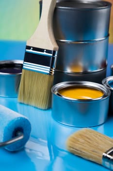 Paint can with a paintbrush