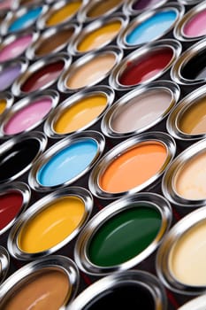 Group of tin metal cans with color paint
