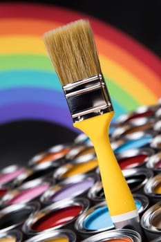 Paint can with a paintbrush
