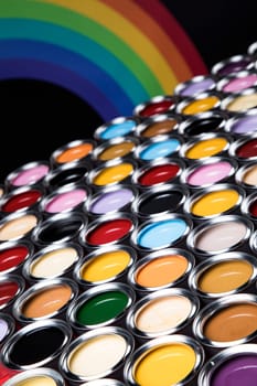 Open buckets with a paint, colors background