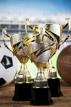 Trophy cup and sport ball background
