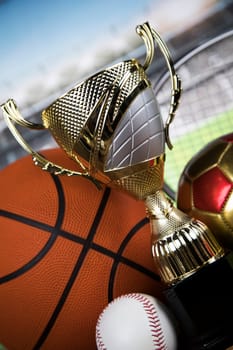 Trophy cup and sport ball background