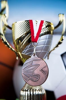 Trophy cup and sport ball background