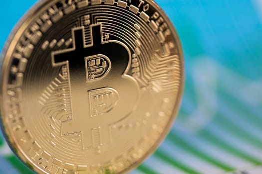 Golden Bitcoin Coin, virtual money, financial chart