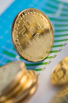 Gold Bitcoin on the background of the chart