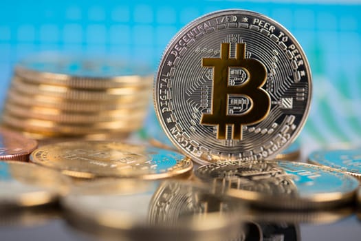 Golden Bitcoin Coin, virtual money, financial chart