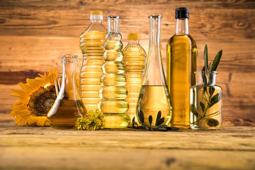 Healthy oil from sunflower, olive, rapeseed oil. Cooking oils in bottle