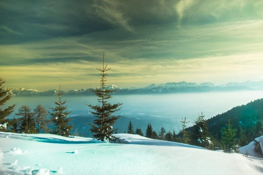 Sunset over the mountains, winter landscape