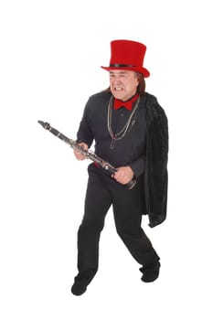 A indigenous man in a black shirt and pants and red hat fighting with.his clarinet in his hand, isolated for white background.