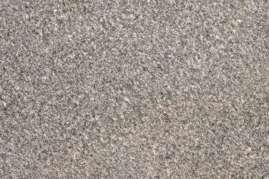 Close up of a gray white carpeting as a background