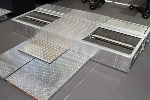 Brake test equipment with rollers in garage