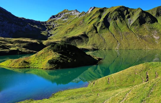 The Schrecksee is a mountain lake in the high Alps