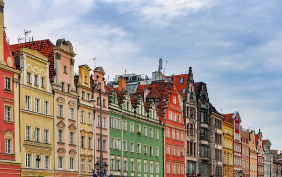 Wroclaw old town houses in Poland, Europe. Blue cloudy sky in background