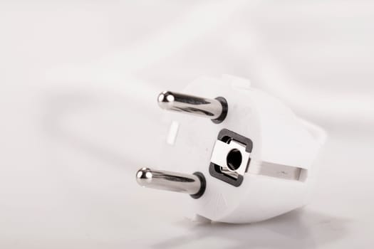 electric plug in closeup - Symbol foto