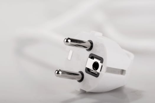 electric plug in closeup - Symbol foto