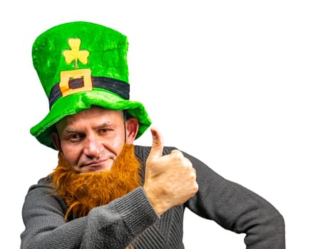 St. Patrick in a green top hat with clover. St.Patrick 's Day. Background image. Place for text. Male model.