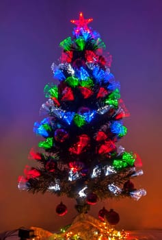 Christmas tree New Year's  with a luminous garland.