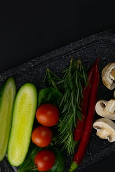 Ketogenic diet concept. A set of products of the low carb keto diet. Green vegetables, nuts, chicken fillet, flax seeds, quail eggs, cherry tomatoes. Healthy food concept. Keto diet food.