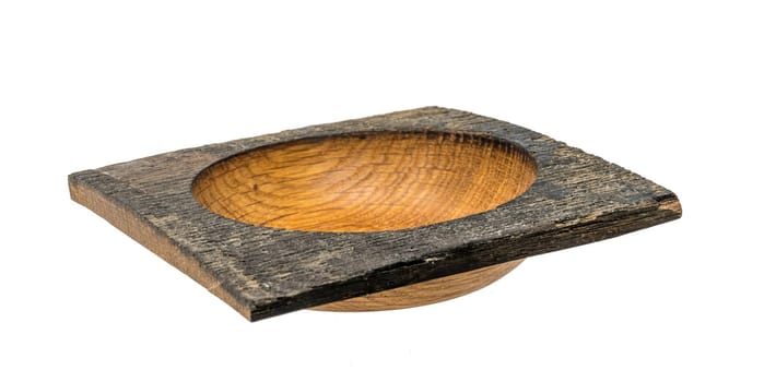 Hand-turned dark oak wooden bowl in square shape isolated on white