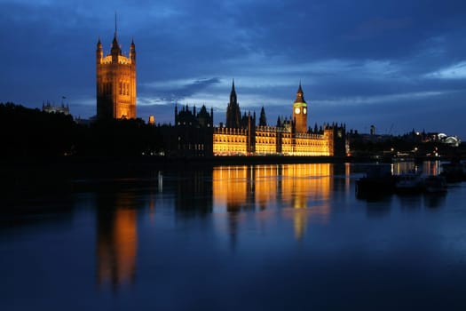 Dusk view of the Houses of Parliament and the River Thames.
